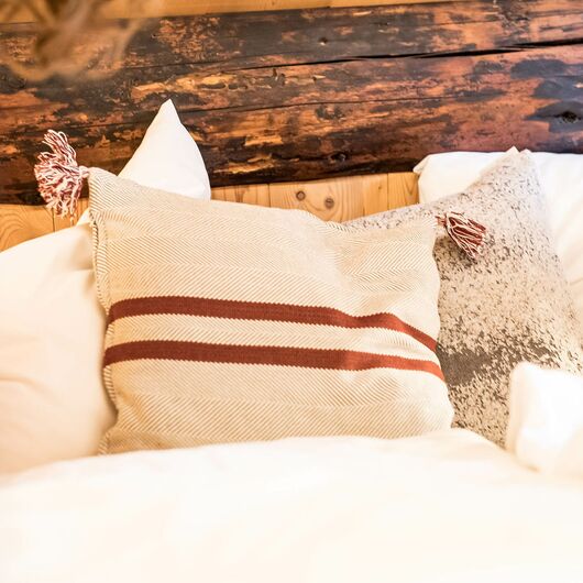 Kopfkissen auf dem Bett